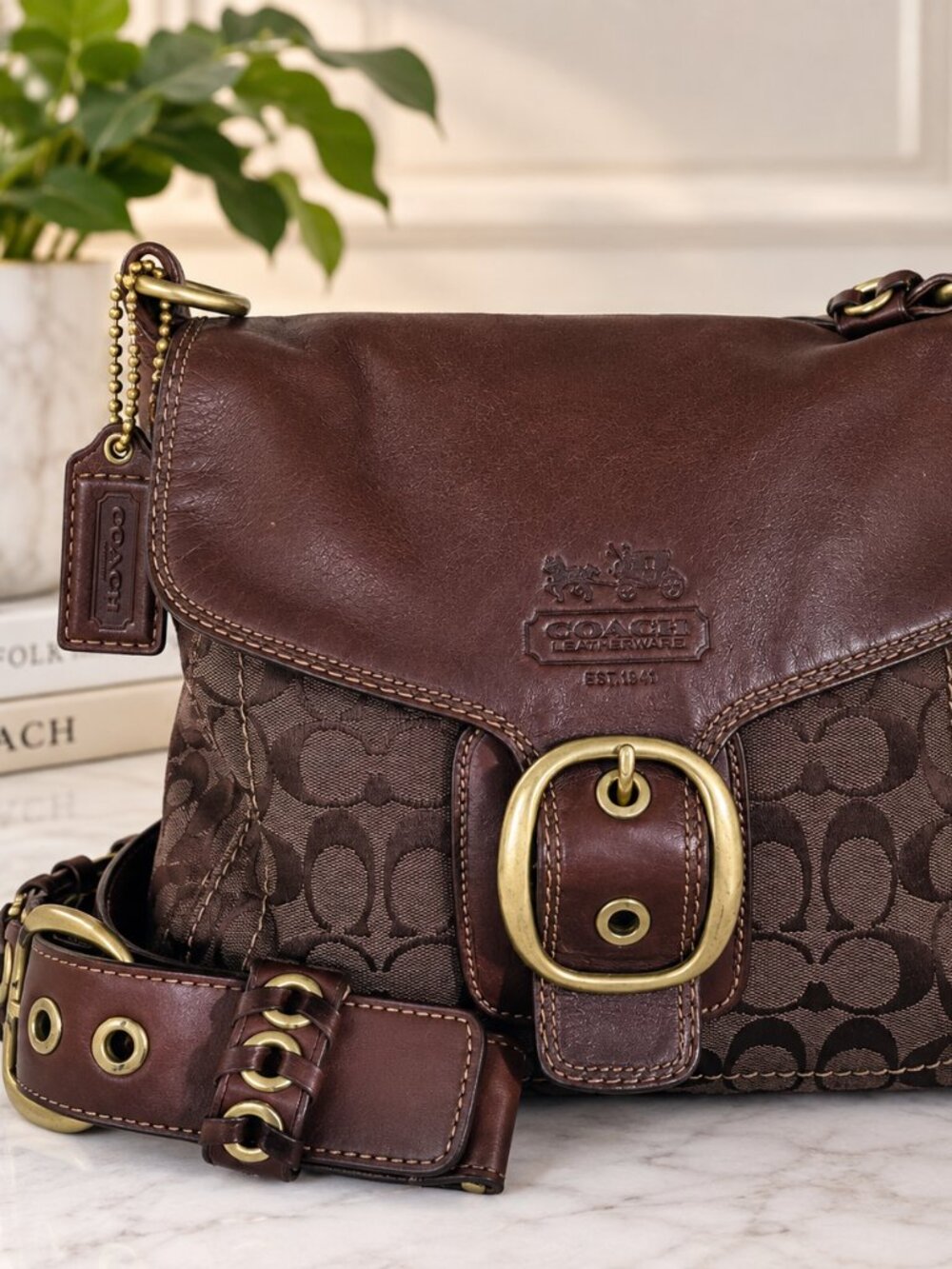 Y2K Coach Bleecker shoulder bag with leather flap signature canvas body.